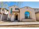 Charming stucco home featuring an arched window and decorative accents at 8429 W Vernon Ave, Phoenix, AZ 85037