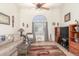 Comfortable living room with a large arched window and decorative accents at 8429 W Vernon Ave, Phoenix, AZ 85037