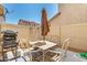 Private patio featuring an umbrella, table, four chairs, and a built-in barbeque at 8429 W Vernon Ave, Phoenix, AZ 85037