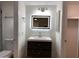 Updated bathroom with vanity, lighted mirror, and updated fixtures at 850 S River Dr # 2018, Tempe, AZ 85281