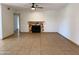 Spacious living room featuring a decorative fireplace and tile flooring at 850 S River Dr # 2018, Tempe, AZ 85281