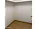 Walk-in closet with neutral tile and trim, ready for organizing and making your own at 850 S River Dr # 2018, Tempe, AZ 85281