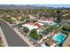 Expansive aerial view of the neighborhood, highlighting the home's pool and outdoor amenities at 10013 N 106Th Pl, Scottsdale, AZ 85258