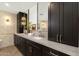 Elegant bathroom with dual sinks, marble countertops, and sleek fixtures at 10013 N 106Th Pl, Scottsdale, AZ 85258