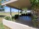 Relaxing covered back patio with views of the well-maintained golf course at 11108 W Cameo Dr, Sun City, AZ 85351