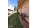 Spacious side yard with desert landscaping and a well-maintained lawn at 11108 W Cameo Dr, Sun City, AZ 85351