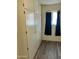Lots of closet storage in this room with wood-look floors and a bright window at 11108 W Cameo Dr, Sun City, AZ 85351
