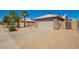 Charming single-story home with a two car garage and desert landscaping at 12622 W Catalina Dr, Avondale, AZ 85392