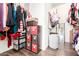 Organized walk-in closet with shelving and storage solutions for efficient space utilization and accessibility at 12622 W Catalina Dr, Avondale, AZ 85392