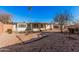 A nice backyard features a brick patio, desert landscaping, and a covered patio at 13008 N 28Th Pl, Phoenix, AZ 85032