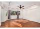 Bright bedroom with hardwood floors, natural light, and direct access to the outside at 13008 N 28Th Pl, Phoenix, AZ 85032