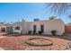 Unique exterior with archway entrance and xeriscaped front yard at 13008 N 28Th Pl, Phoenix, AZ 85032