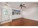 Bright, open living space with hardwood floors and a classic ceiling fan at 13008 N 28Th Pl, Phoenix, AZ 85032