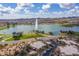 Aerial view showcasing the community, lake, and surrounding desert landscape at 13013 N Panorama Dr # 120, Fountain Hills, AZ 85268