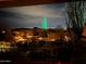 Night view of the community with lit walking path and fountain in the distance at 13013 N Panorama Dr # 120, Fountain Hills, AZ 85268