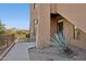 Exterior front entrance with desert landscaping and a glimpse of mountain views at 13013 N Panorama Dr # 120, Fountain Hills, AZ 85268