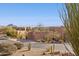 Stunning desert home exterior featuring beautiful landscaping and mountain views on a clear day at 13013 N Panorama Dr # 120, Fountain Hills, AZ 85268