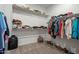 Spacious walk-in closet with organized shelving and ample hanging space for clothes and accessories at 13455 N 142Nd Ave, Surprise, AZ 85379