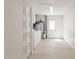 Bright laundry room features modern washer/dryer and storage space at 14803 N 55Th Ave, Glendale, AZ 85306