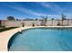 Serene swimming pool provides a relaxing outdoor retreat, complemented by lush landscaping at 14803 N 55Th Ave, Glendale, AZ 85306