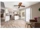 Inviting living space featuring a modern kitchen, open floor plan, and a cozy seating area, perfect for entertaining at 15022 N 22Nd Ln, Phoenix, AZ 85023