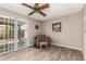 Cozy sitting area with sliding glass doors and tile flooring at 15022 N 22Nd Ln, Phoenix, AZ 85023
