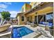 Beautiful backyard features a refreshing plunge pool, outdoor seating, and meticulously maintained landscaping at 18572 N 94Th St, Scottsdale, AZ 85255