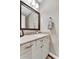 Charming bathroom features a large mirror, white cabinets, and granite countertops at 18572 N 94Th St, Scottsdale, AZ 85255