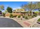 Charming home exterior, showcasing its well-maintained landscape, mature trees, and inviting curb appeal at 18572 N 94Th St, Scottsdale, AZ 85255