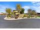 Beautiful desert landscaping surrounds this home with a private front courtyard and view of the facade at 18572 N 94Th St, Scottsdale, AZ 85255