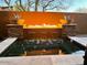 Inviting pool features a fire element and water feature for relaxing outdoors at 18572 N 94Th St, Scottsdale, AZ 85255
