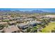 Community view showcases manicured lawns, mature trees, and mountain views at 21256 E Waverly Dr, Queen Creek, AZ 85142