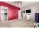 A secondary view of the bedroom reveals the open closet and adjoining entryway at 21256 E Waverly Dr, Queen Creek, AZ 85142