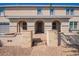 Charming front entrance featuring a paved walkway leading to the front door with stone pillar accents at 21256 E Waverly Dr, Queen Creek, AZ 85142