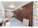 Well-organized garage with dark cabinets and ladder provides ample storage solutions for homeowners at 21256 E Waverly Dr, Queen Creek, AZ 85142