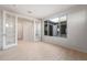 Versatile bonus room featuring French doors, and large window that bathes the space in natural light at 21287 N 272Nd Ln, Buckeye, AZ 85396