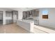 Bright kitchen with gray cabinetry, an island and modern appliances at 21288 N 272Nd Ln, Buckeye, AZ 85396