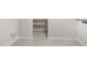 Pantry featuring tile floors and open shelving at 21288 N 272Nd Ln, Buckeye, AZ 85396
