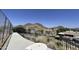 Balcony view showcasing landscape, complemented by outdoor seating for enjoying the scenery at 2233 E Behrend Dr # 85, Phoenix, AZ 85024
