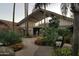 Community clubhouse featuring landscaping and lush plants at 2233 E Behrend Dr # 85, Phoenix, AZ 85024