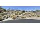 Sloping landscape adorned with desert flora, showcasing the natural terrain of the community at 2233 E Behrend Dr # 85, Phoenix, AZ 85024