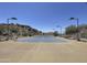 Well-maintained tennis court with mountain views, providing recreational opportunities for residents at 2233 E Behrend Dr # 85, Phoenix, AZ 85024
