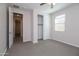 Bedroom features a closet with sliding doors and a view to the hallway at 22463 E Rosa Rd, Queen Creek, AZ 85142