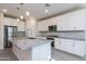 Kitchen with stainless steel appliances, granite countertops, and white cabinets at 22463 E Rosa Rd, Queen Creek, AZ 85142