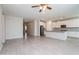 Open concept kitchen, stainless appliances, and island with bar stool seating at 22463 E Rosa Rd, Queen Creek, AZ 85142