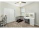 A serene bedroom is staged with modern vanity, ample natural light, and closet space providing a comfortable and functional living area at 2424 S 235Th Dr, Buckeye, AZ 85326