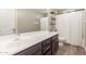 This bathroom features a vanity, toilet, and shower/tub combo with stylish, neutral finishes at 2765 E Gillcrest Rd, Gilbert, AZ 85298