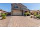 Charming two-story home with a paver driveway and well-maintained landscaping at 2765 E Gillcrest Rd, Gilbert, AZ 85298