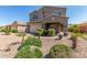 Attractive two-story home with a well-manicured front yard and paver driveway at 2765 E Gillcrest Rd, Gilbert, AZ 85298