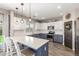 Well-lit kitchen with two-tone cabinets, a modern countertop, and stainless steel appliances at 2765 E Gillcrest Rd, Gilbert, AZ 85298